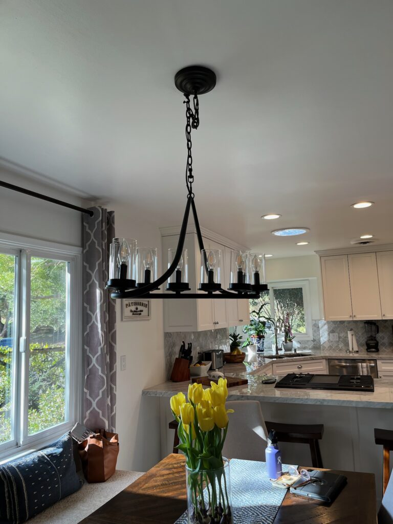 Beautiful light fixture hung above the kitchen nook in Ventura
